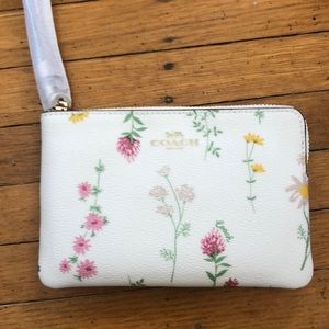 Coach wild flower wristlet. NWT
